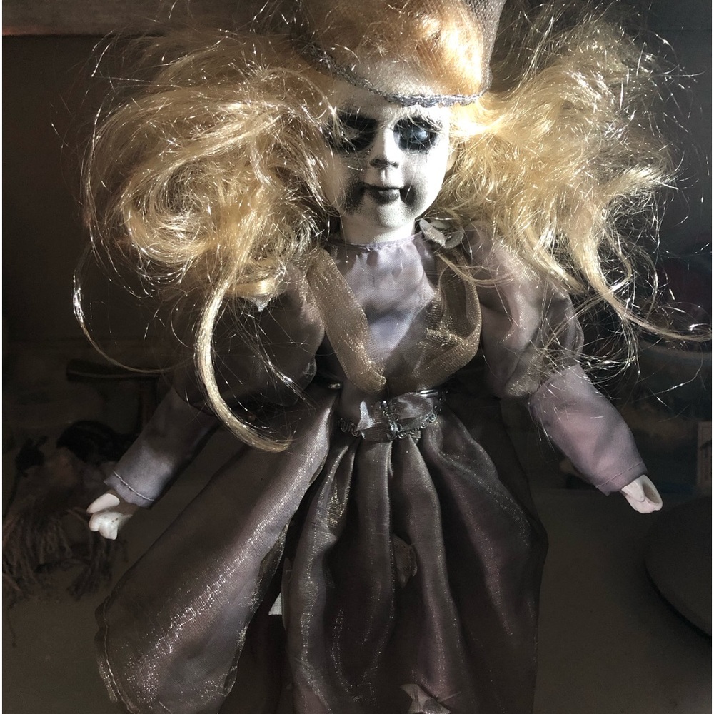Creepy wizard vintage porcelain doll